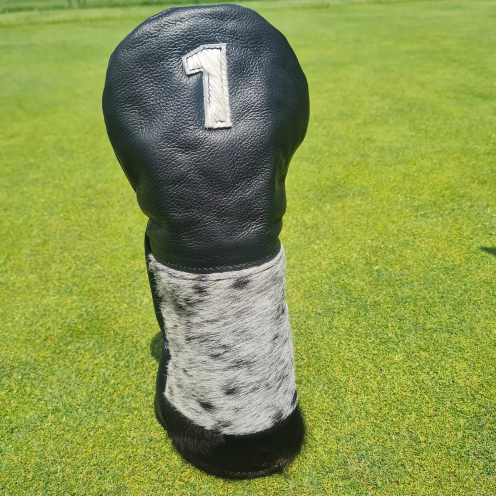 Black leather golf headcover with Nguni hide made by Thirty Six Golf